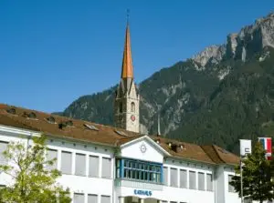 view of white and brown concrete building during daytime